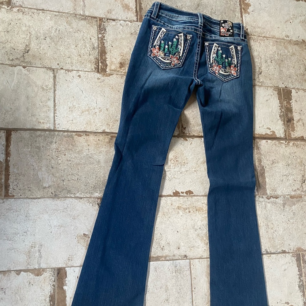 Like-New western style Miss Me jeans.